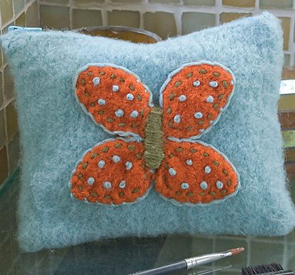 Free knitting pattern for Felted Butterfly Makeup Bag