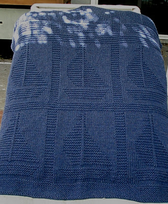 Free knitting pattern for Come Sail Away baby blanket - Sailboats in knit and purl decorate this baby blanket designed by Suzanne Veta. 28″ x 32″
