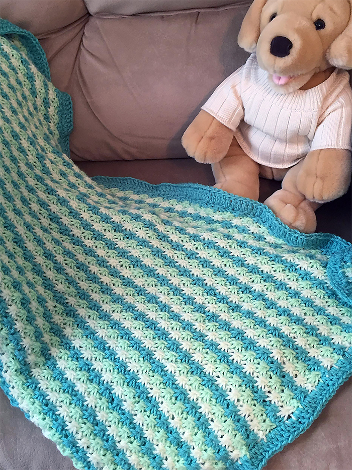 Free knitting pattern for Daisy Stitch Baby Blanket and more baby blanket knitting patterns