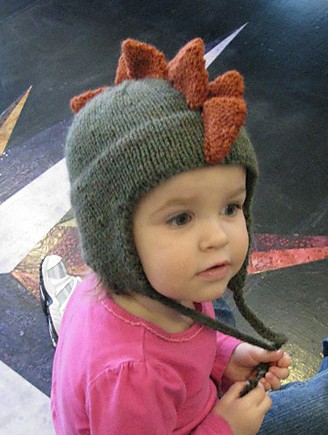 Free knitting pattern for Dino Cap dinosaur earflap hat with spines like a stegosaurus baby and toddler sizes