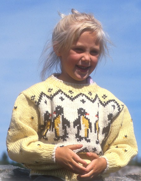 Free knitting pattern for children's sweater with penguins