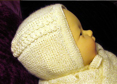 Princess Bonnet Free Knitting Pattern | Royal Family Knitting Patterns | This baby bonnet was designed by Rian Anderson after the bonnet the new baby Princess Charlotte wore in her public debut