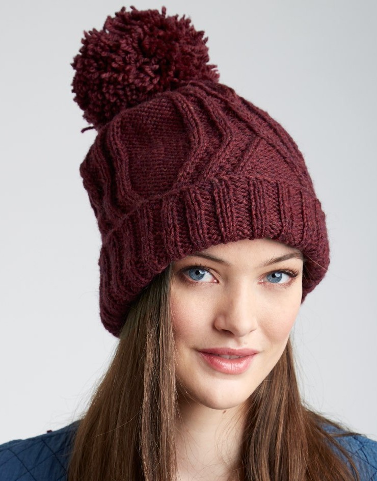Free knitting pattern for Cable Traveller Hat with pompom