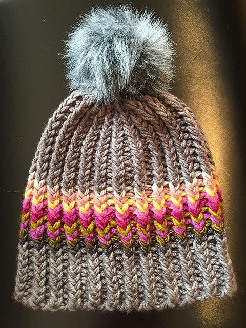 Free knitting patern for Twisted Ribster hat with pompom - great stash buster