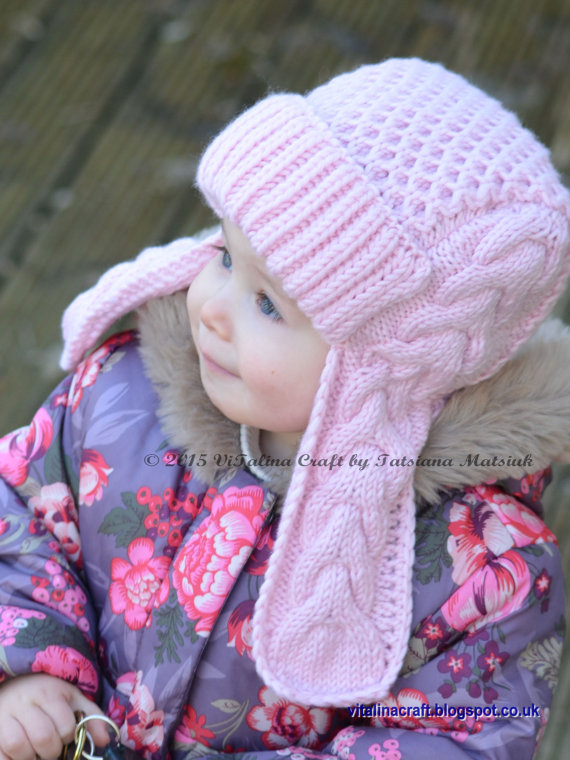 Knitting pattern for Winterberry Earflap Hat for Toddlers and Children with aviator style brim and cabled earflaps
