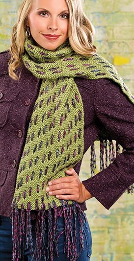 Free knitting pattern for Woven Mesh Scarf and more colorful scarf knitting patterns. I love this idea! Lee Gant designed this easy garter stitch scarf dressed up by weaving yarn strands through the scarf that end up as fringe. Ingenious!
