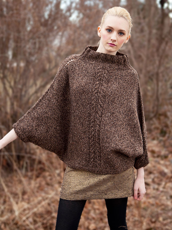 Poncho sweater with outlet sleeves