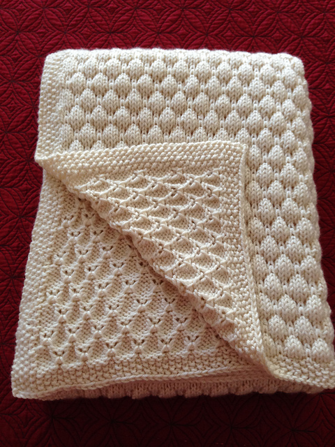 Free knitting pattern for Dean's Blanket - easy baby blanket with coin stitch Designed by Tree Crispin, this pattern can easily be modified to make it larger or smaller as well as changing the border. The coin stitch pattern is a multiple of 4 stitches plus 1.