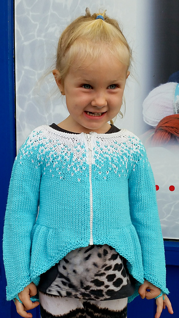 Elsa Cardigan Knitting Pattern by Helga Linnet | Frozen Inspired Knitting Patterns at https://intheloopknitting.com/frozen-knitting-patterns