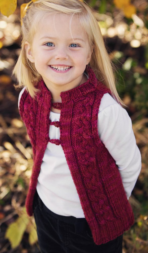 Knitting pattern for Dulce Cable Vest for babies and kids