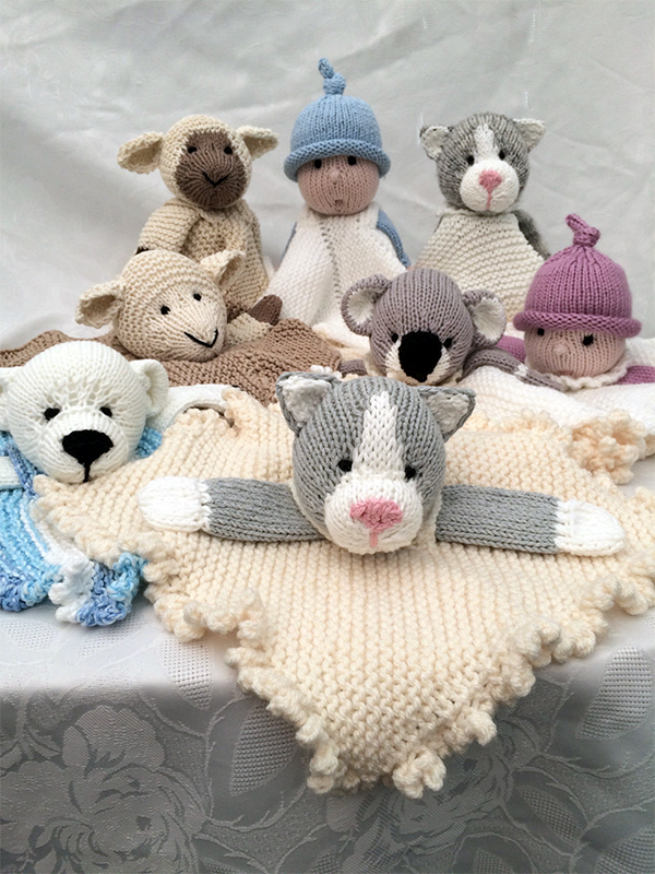 Knitting pattern for Mini Cuddly Blankies with Cat, lamb, polar bear, doll and koala.