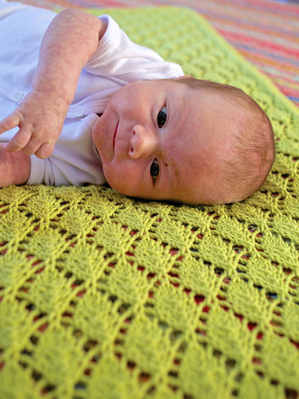 Free knitting pattern for Saurey Baby Blanket with leaf lace and more baby blanket knitting patterns