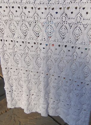 Free knitting pattern for Skull and Crossbones Lace